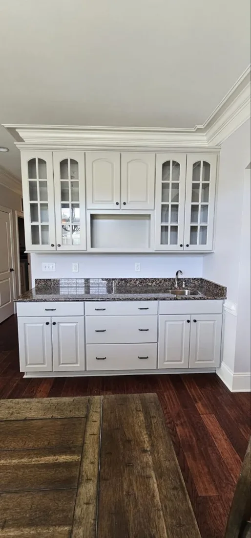 White bathroom cabinetry and finished walls