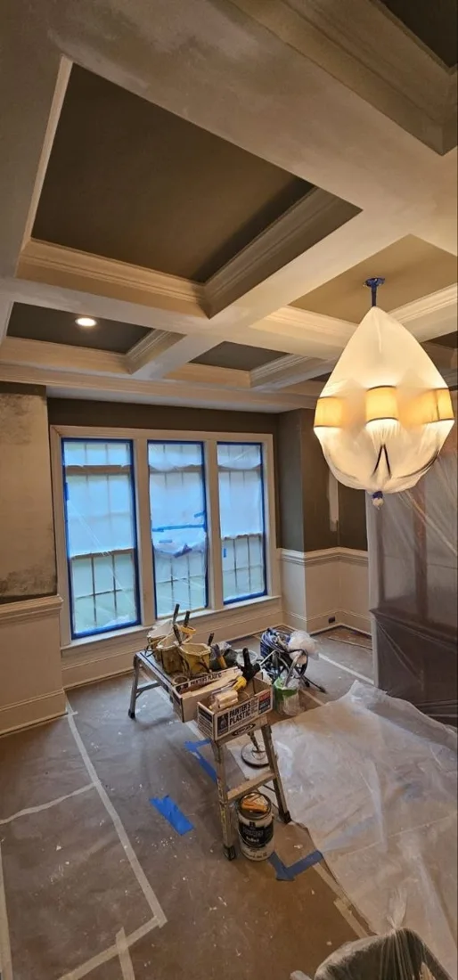 Coffered ceiling and window trim during interior work