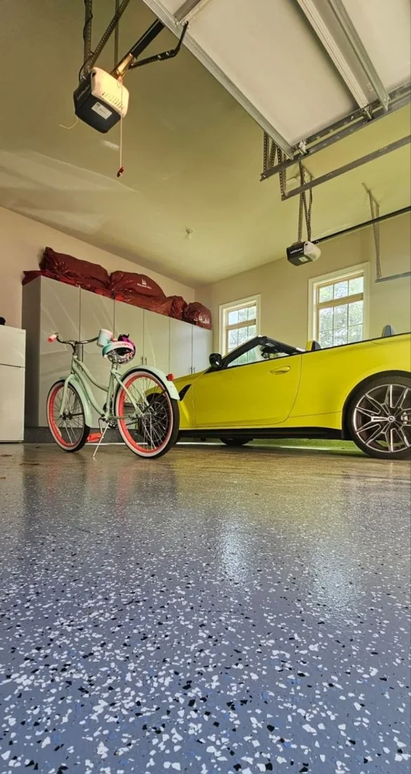 Decorative garage floor coating with a flake finish
