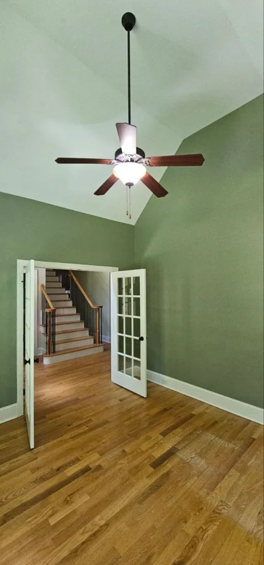 Interior with green painted walls and white trim