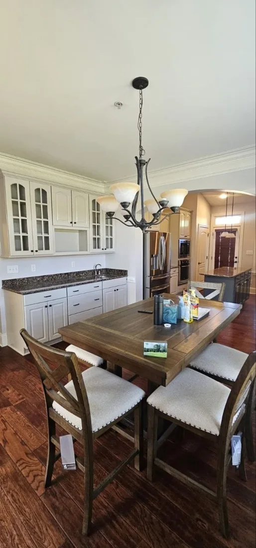 Kitchen island and white cabinetry