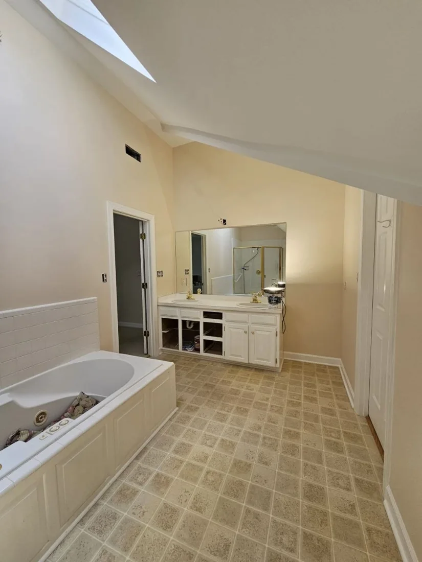 Bathroom with a smooth finished ceiling