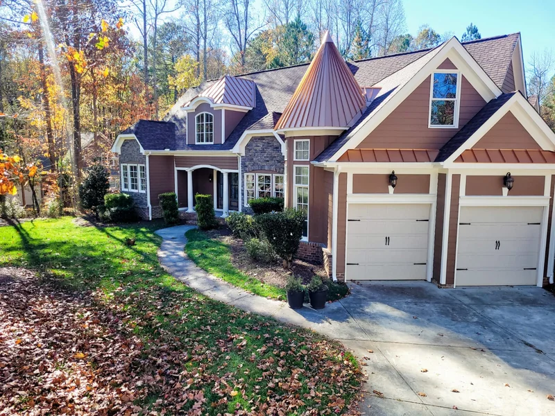 House exterior with gables and a driveway